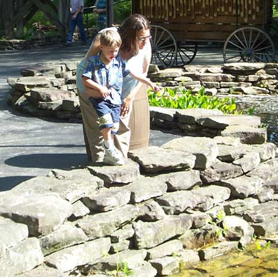 Carrie and Bond looking at Tadpoles at Dollywood, Pigeon Forge Tennessee